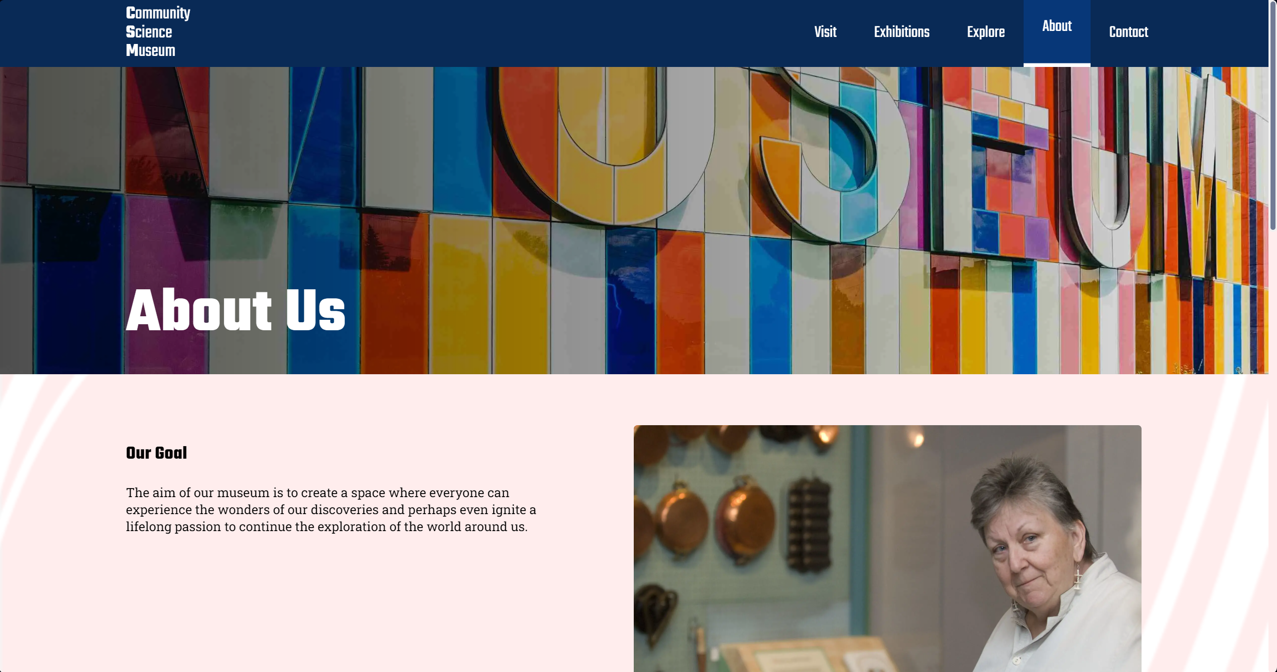 A Screenshot of the PC version of a website called 'Community Science Museum', featuring the websites 'About Us' page. The text on the website describes the goal of the museum, which is to create a space for people to experience discoveries and ignite a passion for exploring the world.